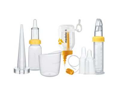 A collection of various Medela specialty feeding products