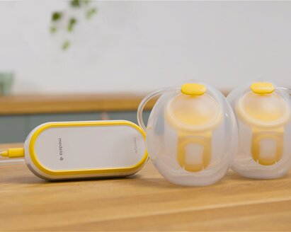 Freestyle™ Hands-free double electric wearable breast pump Medela Freestyle™ Hands-free double electric wearable breast pump sitting on counter