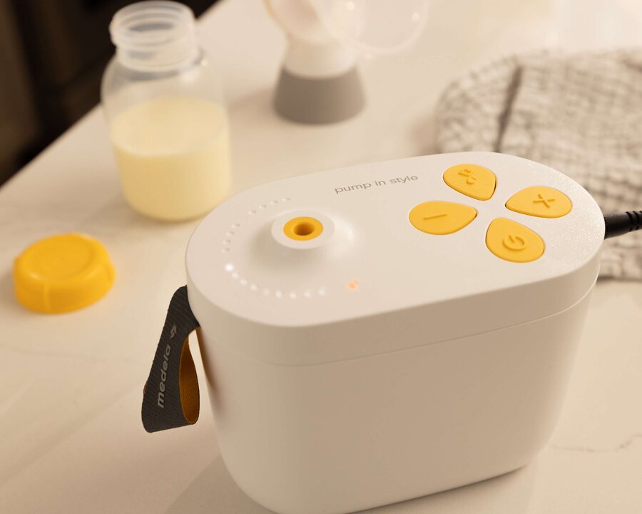 Pump In Style Pro breast pump sitting on kitchen counter.