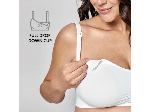 Woman wearing a white Medela Keep Cool™ Ultra Bra front view with text, "Full drop down cup"