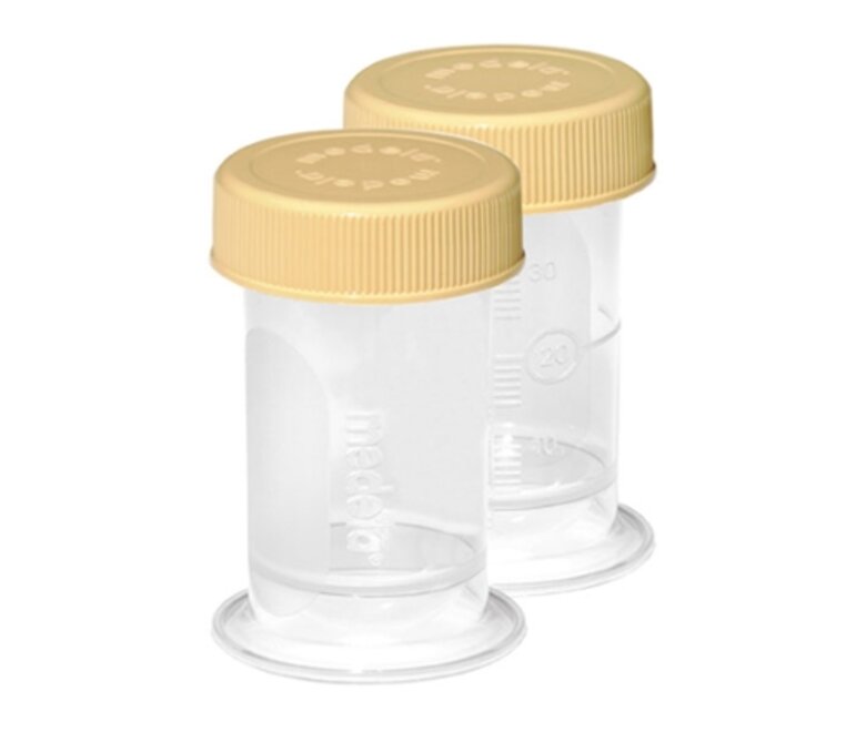 Two disposable 35 ml Medela Colostrum Containers with lids.