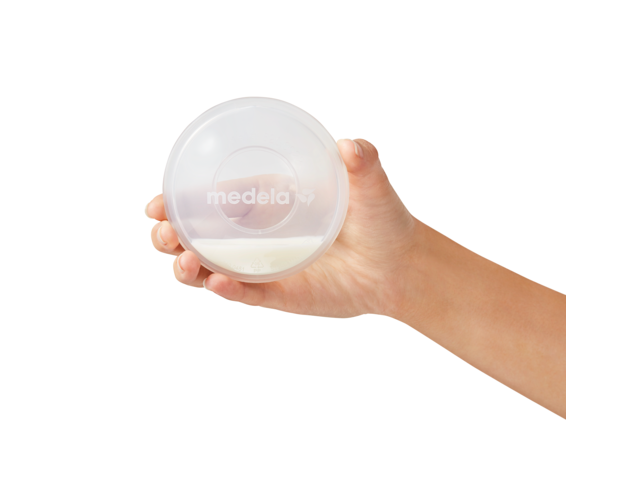 Saved excess breast milk collected in the Medela Milk Collection Shells