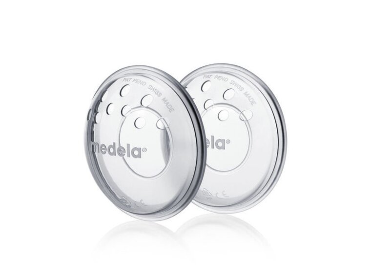 Schuine weergave van een paar Medela Tepelbeschermers.