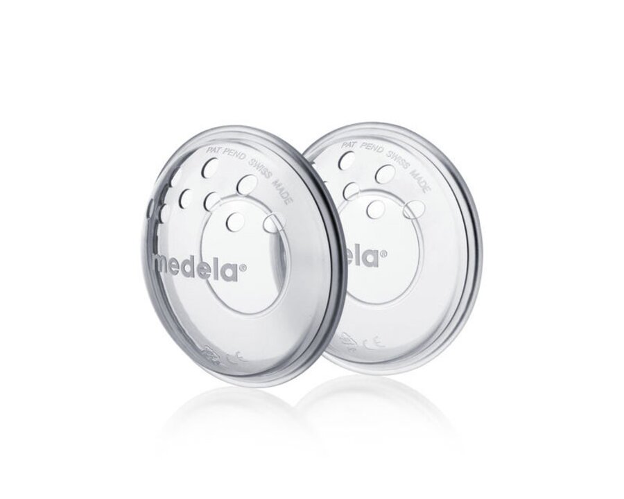 Schuine weergave van een paar Medela Tepelbeschermers.