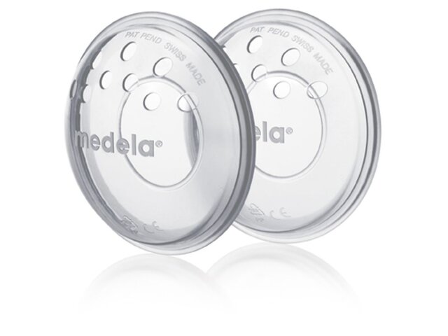 Angled view of a pair of Medela SoftShells™ breast shells.