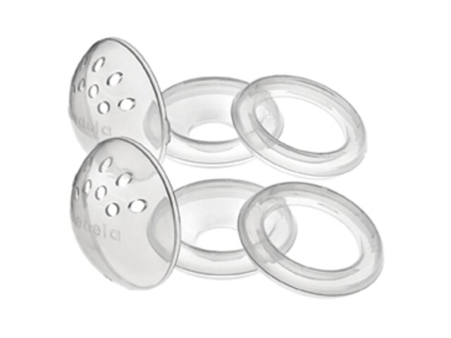 A pair of Medela TheraShells™ Breast Shells, disassembled into its 3 parts: dome, cone and ring.