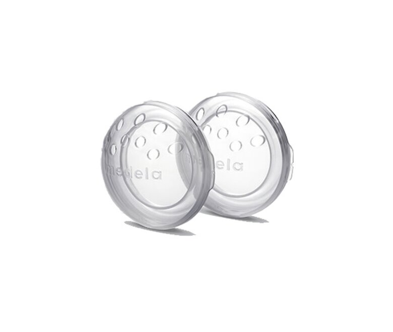 Angled view of a pair of Medela TheraShells™ Breast Shells.