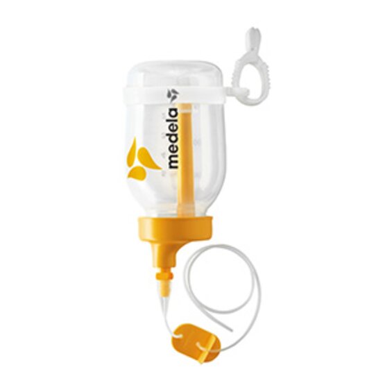 Een geassembleerd Supplemental Nursing System™ (SNS) met de bijbehorende onderdelen.