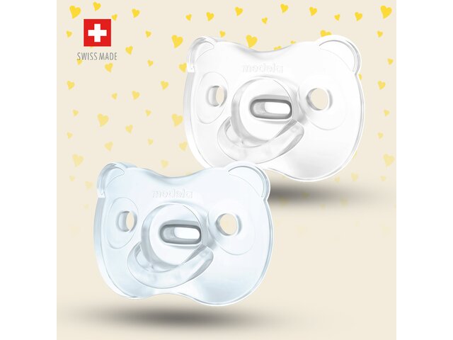 The Medela SOFT SILICONE dummy with SensoPearls™ in blue and transparent, 2x. Includes "Swiss Made" icon and text.