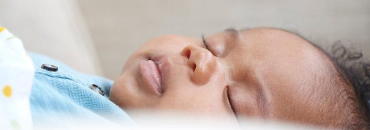 Close-up of a sleeping baby boy.