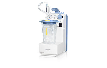 A side view of the Medela Vario 18 c/i AC/DC Suction Pump with a 1.5l disposable suction jar.