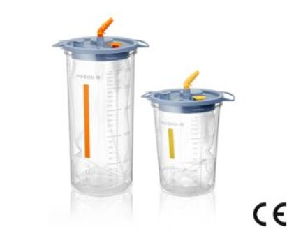 Die Medela Disposable Collection System (DCS) Saugdosen, gelb für 1500cc und orange für 2500cc, zur Verwendung mit chirurgischen Pumpen.