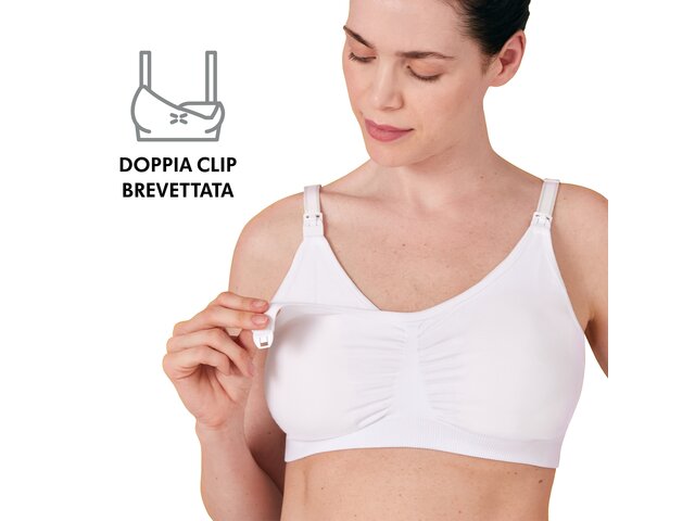 Una donna che indossa il reggiseno 3in1 per l'allattamento e il pompaggio, di colore bianco, toglie la spallina. Include il testo: “doppia clip brevettata”.