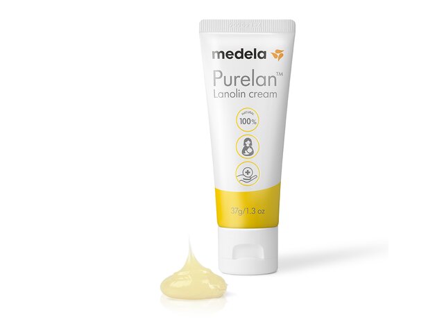 Tube of Medela Purelan™ lanolin cream 37 g with a droplet of cream next to it.