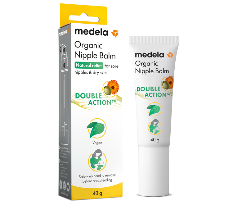 Un tubetto da 40 g di crema per capezzoli biologica di Medela accanto alla confezione di vendita.