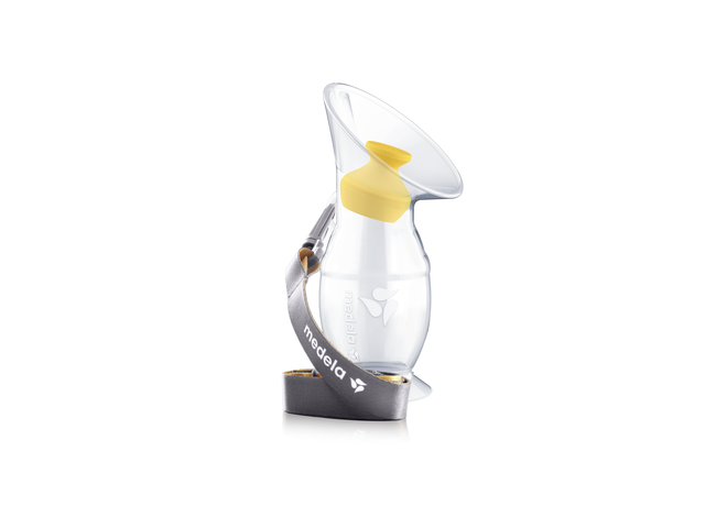 The Medela Silicone breast milk collector with stopper and lanyard.