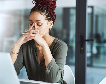 woman sitting in front of latop