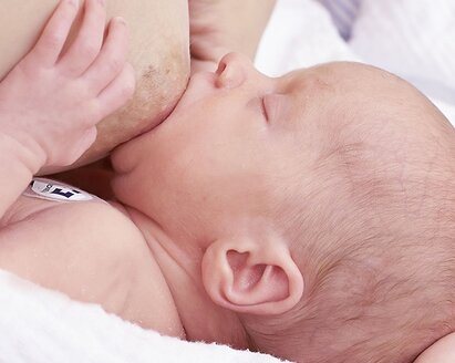 Close-up of a nursing baby.